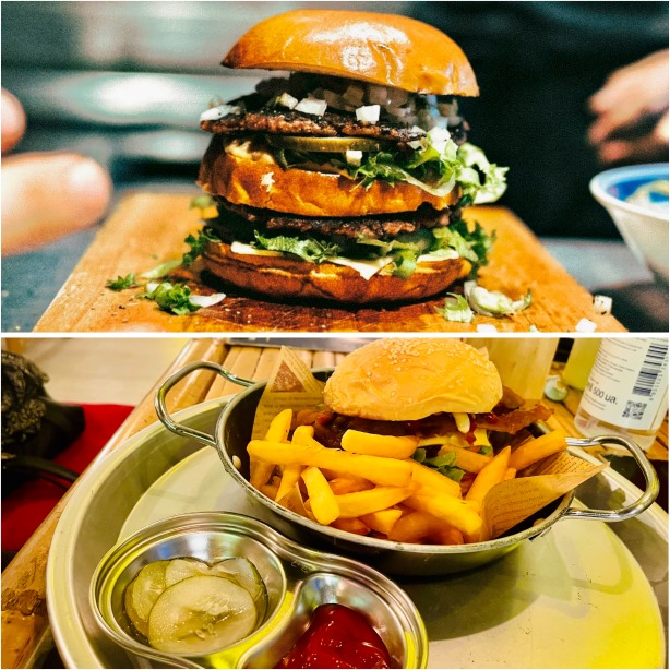 Restaurants Vintage Burgers und Friendship Concept, 2 verschiedene Burger auf Brett und Teller